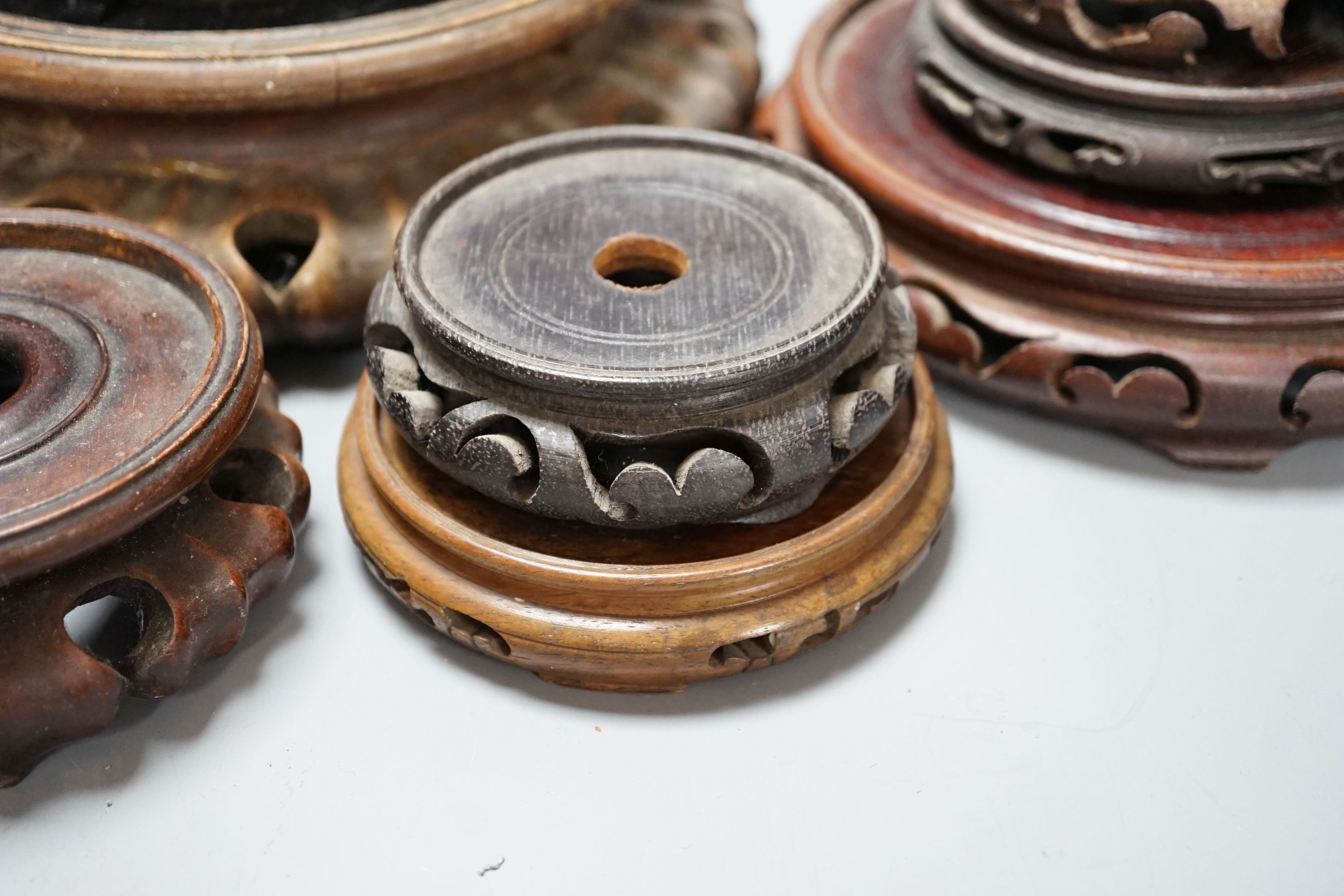A Quantity of Oriental wooden plinths various sizes
